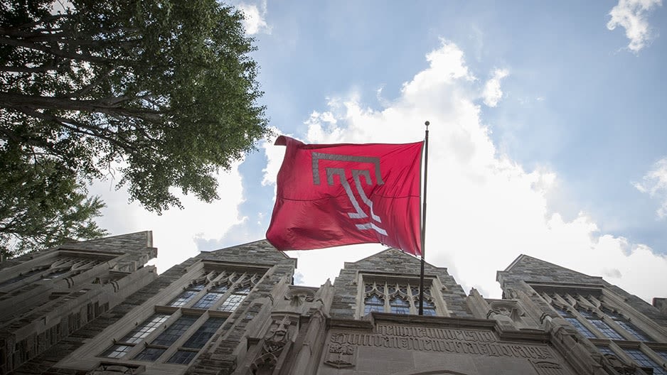 Temple flag flying outside Sullivan Hall